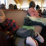 TIM ISBELL/THE SUN HERALDLynell Jackson takes a nap while the rest of the congregation of Little Rock Baptist Church in Gulfport celebrates the life of the Rev. Martin Luther King Jr. PHOTOGRAPHER'S COMMENTS -- Whenever on assignment, I try to find a photo that isn't the obvious photo. Many times these are the more memorable photos instead of a speaker behind the podium. I thought this was a classic little kid snoozing in church photo. I brought back memories when I was little and would take naps during the sermon.